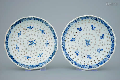 A pair of blue and white Chinese porcelain strainers after Delft examples, 18th C.