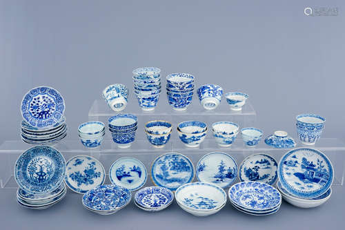 A collection of 30 saucers and 31 cups in blue and white Chinese porcelain, 18/19th C.