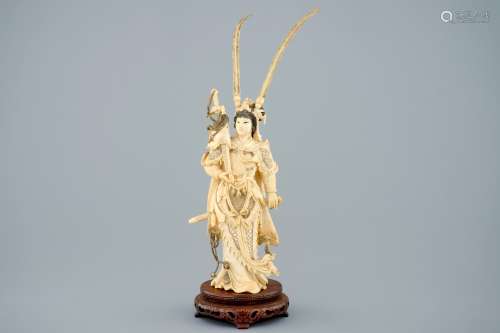 A Chinese carved ivory figure of Hua Mulan on a wooden base, late 19th C.