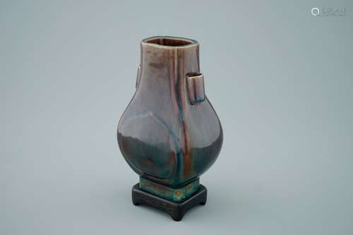 A Chinese monochrome aubergine fanghu shape vase, 19th C.