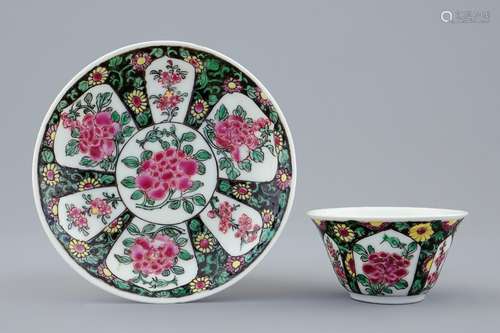 A Chinese famille noire cup and saucer, Yongzheng, 1723-1735