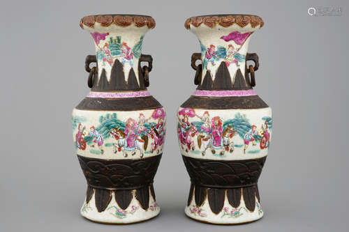 A mirrored pair of Chinese famille rose Nanking vases, 19th C.