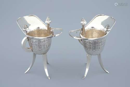 A pair of Chinese silver archaic 