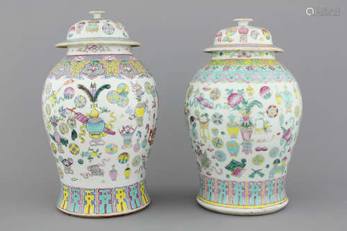 Two Chinese porcelain famille rose jars and covers with scholar's objects, 19th C.