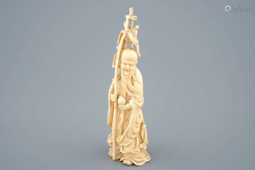 A Chinese carved ivory figure of Shou Lao, late 19th C.