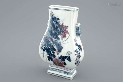A Chinese blue and underglaze red fanghu shape wall vase, 19th C.