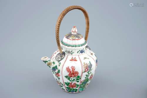 A Chinese famille verte teapot and cover with replacement handle, Kangxi