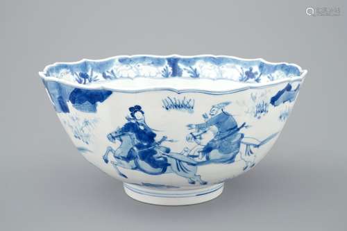 A Chinese blue and white soft paste bowl with horseriders, Kangxi