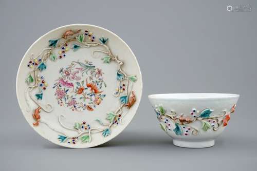 A Chinese relief-decorated famille rose cup and saucer with squirrels, Yongzheng, 1723-1735