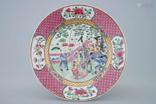 A Chinese famille rose plate with figures in a garden, Yongzheng, 1723-1735