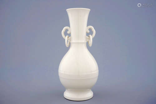 A monochrome blanc de Chine Dehua vase with underglaze design, Kangxi