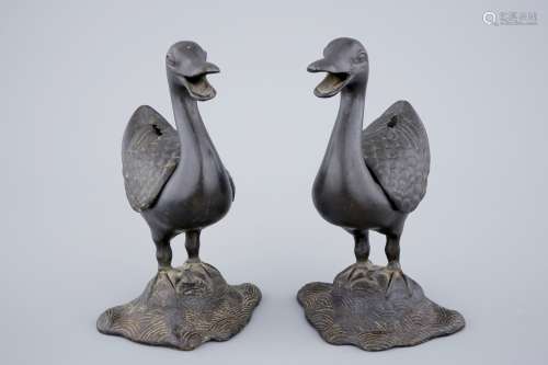 A pair of Chinese bronze duck-shaped incense burners, 18/19th C.