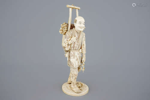 A Japanese carved ivory figure of a lumberjack, Meiji, 19th C.