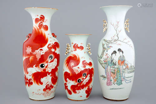 Two Chinese vases with foo dogs and a vase with ladies in a garden, 19/20th C.