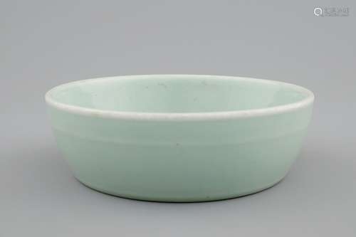 A Chinese celadon bowl, Qianlong mark, 19/20th C.