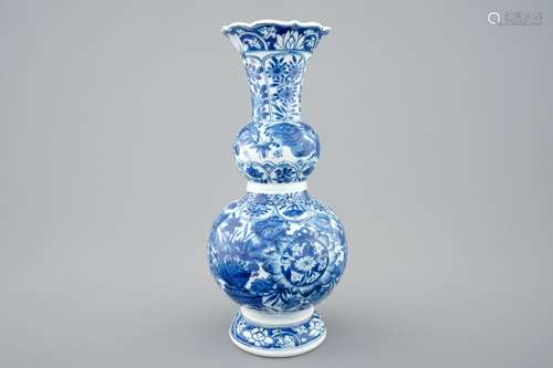 A Chinese blue and white double gourd vase with butterflies, Kangxi