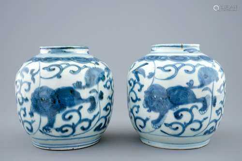 A pair of Chinese blue and white vases with buddhist lions, Ming, Wanli, 1573-1619