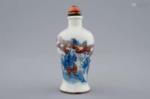 A Chinese blue, white and underglaze red snuff bottle, 19th C.
