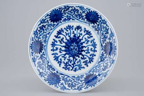 A Chinese blue and white lotus scroll plate, Xuande mark, Kangxi