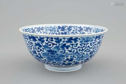 A Chinese blue and white peony scroll bowl, Qianlong mark and of the period