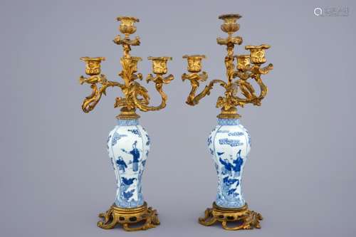 A pair of ormolu-mounted candelabra blue and white Chinese vases, Kangxi