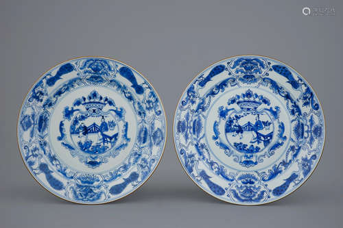 A pair of Chinese blue and white dishes with crowned medallions, Kangxi