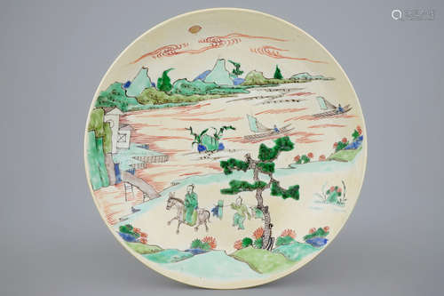 A rare Chinese famille verte café au lait ground landscape dish, Kangxi