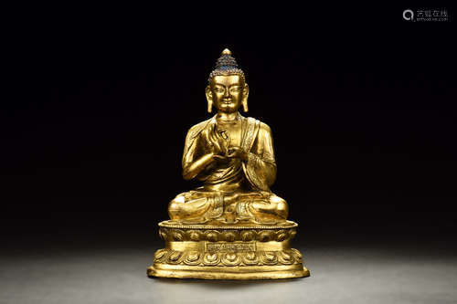 GILT BRONZE SHAKYAMUNI SEATED FIGURE