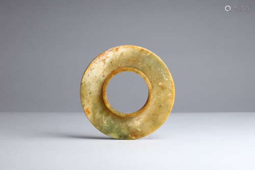 JADE CARVED DISC WITH RAISED INNER LIPS
