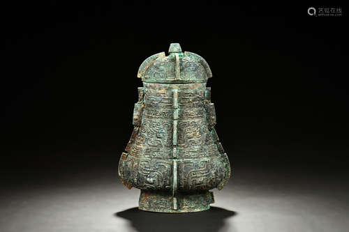 ARCHAIC BRONZE CAST JAR WITH COVER