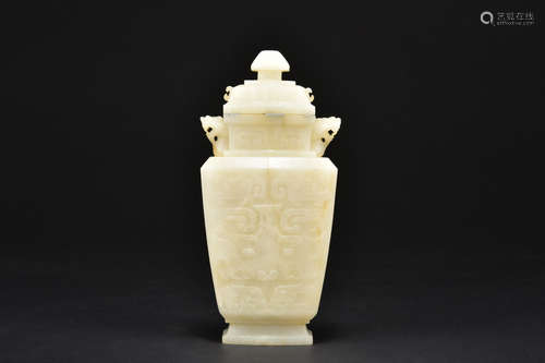 CARVED WHITE JADE ARCHAIC STYLE VASE WITH COVER