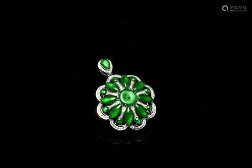 JADEITE CARVED 'SUN FLOWER' PENDANT WITH DIAMONDS