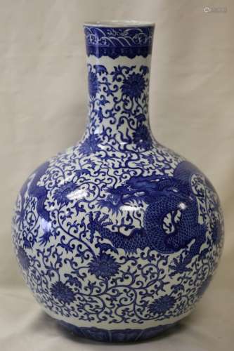 A Blue and White Dragon Bottle Vase