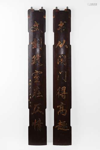 A couplet calligraphy on rosewood panels