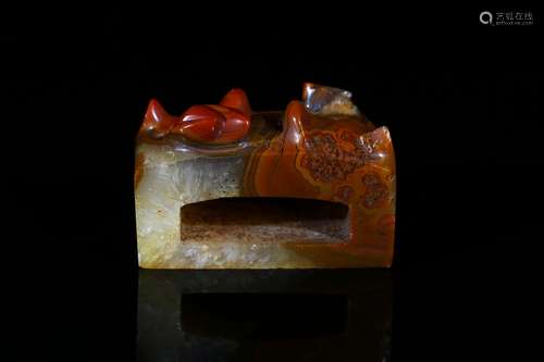 A carnelian agate carved sword slide