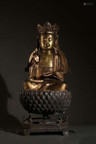 A large gilt bronze Shakyamuni on lotus base