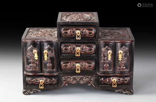 A carved zitan combination box