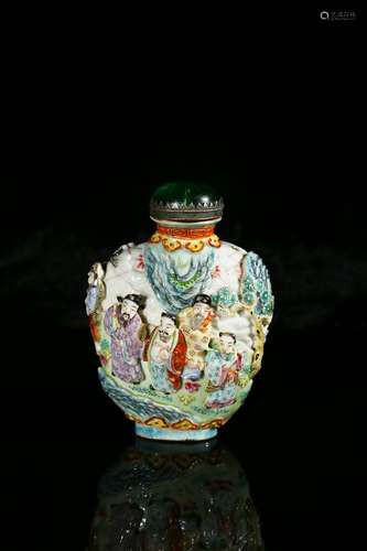 A famille rose moulded ‘eight immortals’ snuff bottle