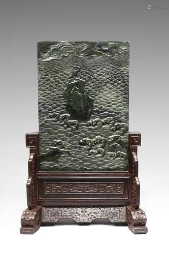 A spinach  green jade 'crane' table screen