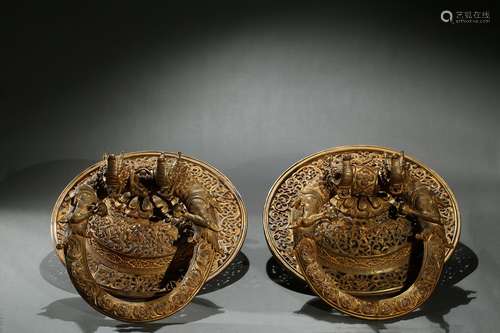 Gilt-bronze Tibetan monastery door knockers pair