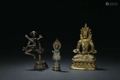 A set of three bronze bodhisattva figures