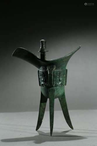 A bronze 'taotie' ritual Jue vessel