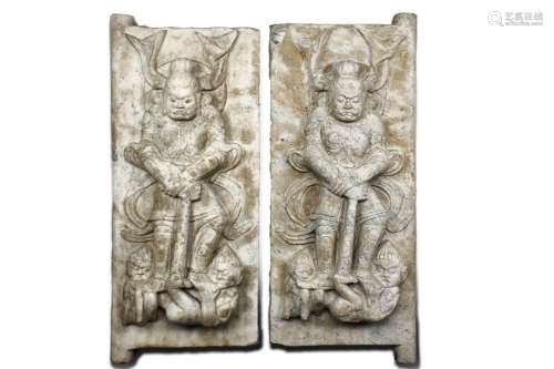 A pair of marble carved 'Guardian' steles