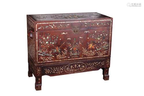 An 'eight treasures' decorated wooden chest