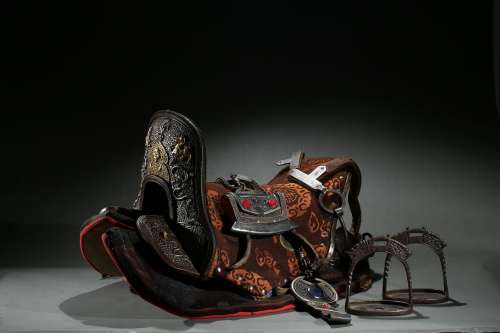 A gilt-silver alloy 'dragons' horse saddle