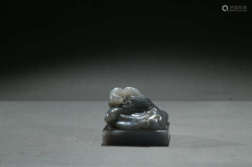 A black and white jade seal