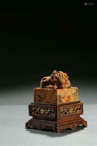 A famille rose 'buddhist lion' seal w/ stand