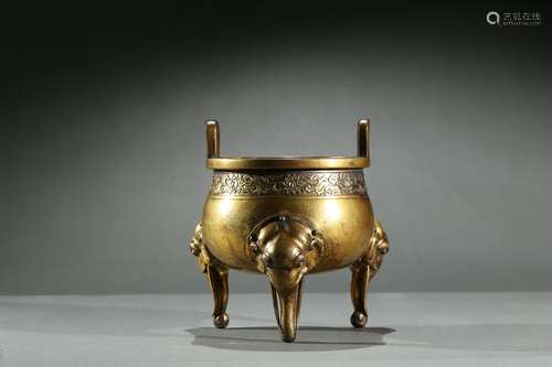 A gilt-bronze 'elephant' tripod censer