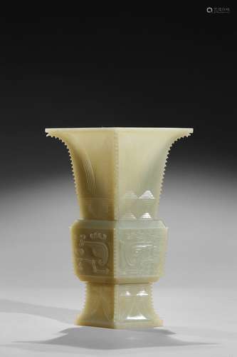 A white jade carved archaistic vessel