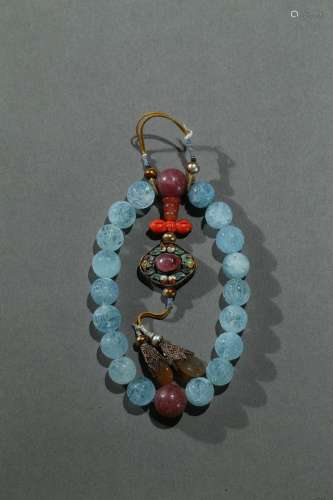 An aquamarine and tourmaline rosary bracelet